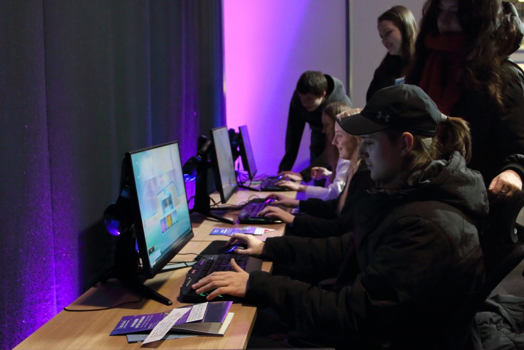 Young people at computers during Datorium Tech Stage