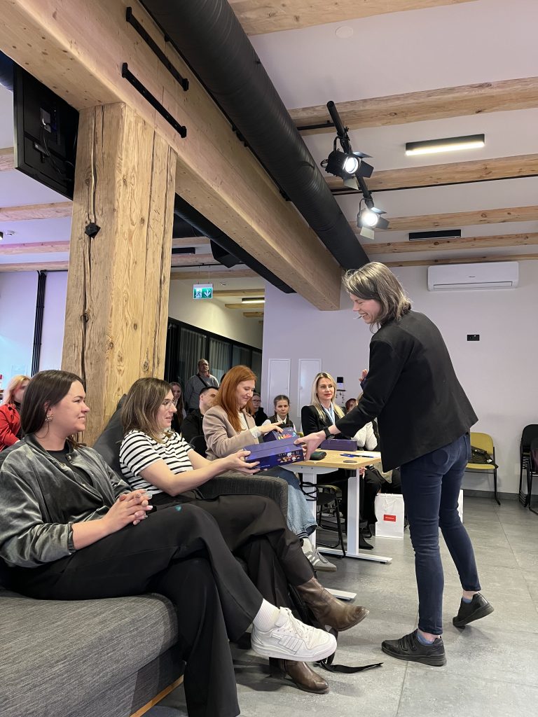 A speaker addressing participants at the PyGirls event